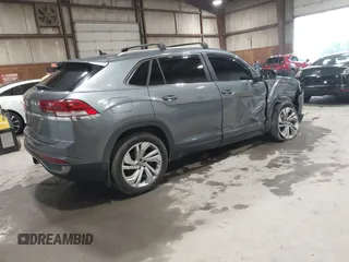 2021 Volkswagen Atlas SEL z VIN 1V2BE2CA6MC203777, wystawiony jako IAAI lot #42507511 z przebiegiem 76 358 mil mil oraz . Historia ofert i sprzedaży dostępna na DreamBid. Obrazek 4.