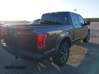 2015 Ford F-150 XLT with VIN 1FTEW1EG2FFC78324, listed as a IAAI auction lot 40708845 with 123,939 mi miles. Bid and sale history available at carsss.com. Image 4.