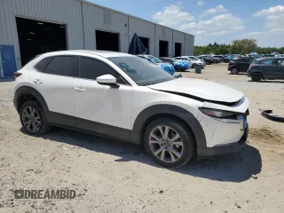 2021 Mazda CX-30 Preferred with VIN 3MVDMBCL4MM217592, listed as a Copart auction lot 55247985 with 91,398 mi miles and Non repairable. Bid and sale history available at DreamBid. Image 4.