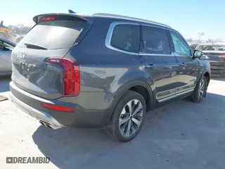 2022 Kia Telluride S with VIN 5XYP6DHC6NG236642, listed as a IAAI auction lot 41696702 with 63,505 mi miles. Bid and sale history available at carsss.com. Image 4.