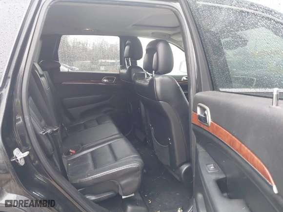 2013 Jeep Grand Cherokee Limited with VIN 1C4RJFBG0DC656382, listed as a IAAI auction lot 41870162 with 162,869 mi miles. Bid and sale history available at carsss.com. Image 8.