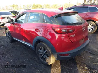2017 Mazda CX-3 Grand Touring with VIN JM1DKFD77H0165528, listed as a IAAI auction lot 40942595 with 89,648 mi miles. Bid and sale history available at carsss.com. Image 3.