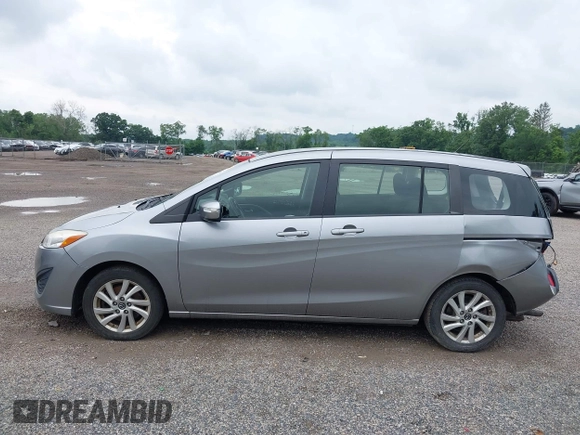2014 Mazda 5 Sport z VIN JM1CW2BL5E0172594, wystawiony jako IAAI lot #42628707 z przebiegiem 180 369 mil mil oraz . Historia ofert i sprzedaży dostępna na DreamBid. Obrazek 15.