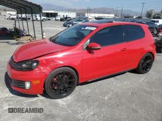2012 Volkswagen GTI w/Conv & Sunroof z VIN WVWEV7AJ8CW148101, wystawiony jako Copart lot #74610214 z przebiegiem 154 813 mil mil oraz Szkoda całkowita • Salvage title. Historia ofert i sprzedaży dostępna na DreamBid. Obrazek 1.