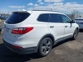 2014 Hyundai Santa Fe Limited z VIN KM8SNDHF8EU080086, wystawiony jako IAAI lot #41995020 z przebiegiem 168 532 mil mil oraz . Historia ofert i sprzedaży dostępna na DreamBid. Obrazek 4.