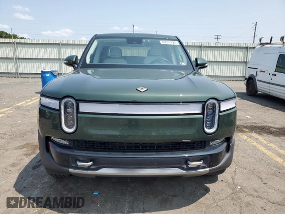 2022 Rivian R1T Adventure z VIN 7FCTGAAA5NN013983, wystawiony jako Copart lot #68013724 z przebiegiem 9 006 mil mil oraz Szkoda całkowita • Salvage title. Historia ofert i sprzedaży dostępna na DreamBid. Obrazek 5.
