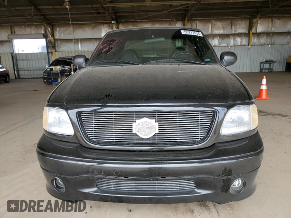 2000 Ford F-150 XL z VIN 2FTRX07L5YCB06306, wystawiony jako Copart lot #66777554 z przebiegiem Nie podano mil oraz Szkoda całkowita • Salvage title. Historia ofert i sprzedaży dostępna na DreamBid. Obrazek 5.