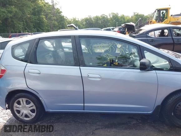 2009 Honda Fit with VIN JHMGE88209S052443, listed as a IAAI auction lot 42406572 with 140,343 mi miles and . Bid and sale history available at DreamBid. Image 12.