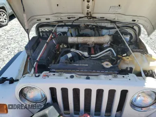 2004 Jeep Wrangler Sport with VIN 1J4FA49S94P751849, listed as a Copart auction lot 55519445 with 139,854 mi miles and Salvage title. Bid and sale history available at DreamBid. Image 11.