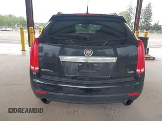 2014 Cadillac SRX Luxury Collection z VIN 3GYFNEE36ES677883, wystawiony jako IAAI lot #42260861 z przebiegiem 51 730 mil mil oraz . Historia ofert i sprzedaży dostępna na DreamBid. Obrazek 16.