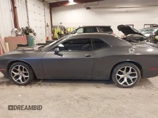 2016 Dodge Challenger SXT with VIN 2C3CDZAG7GH138288, listed as a IAAI auction lot 41128028 with 110,973 mi miles and . Bid and sale history available at DreamBid. Image 14.