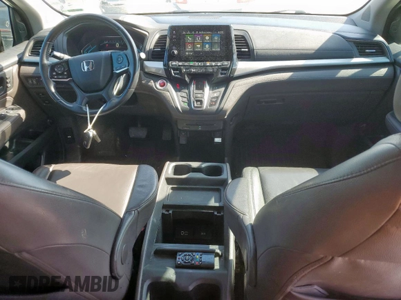 2018 Honda Odyssey Touring с VIN 5FNRL6H8XJB042111, выставлен на аукционе Copart как лот 52360005 с пробегом 126 835 миль миль и Чистый • Clean title. История ставок и продаж доступна на DreamBid. Изображение 8.