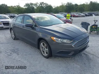2018 Ford Fusion SE z VIN 3FA6P0HD6JR279863, wystawiony jako IAAI lot #42295685 z przebiegiem 75 347 mil mil oraz . Historia ofert i sprzedaży dostępna na DreamBid. Obrazek 1.