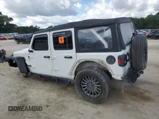 2023 Jeep Wrangler Sport с VIN 1C4HJXDGXPW596127, выставлен на аукционе Copart как лот 56645205 с пробегом 64 257 миль миль и Списание • Salvage title. История ставок и продаж доступна на DreamBid. Изображение 2.