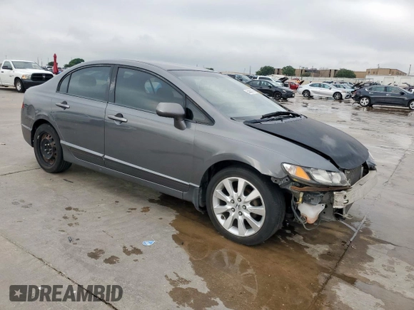 2010 Honda Civic LX with VIN 2HGFA1F52AH315977, listed as a Copart auction lot 54240115 with 217,883 mi miles and Salvage Title. Bid and sale history available at DreamBid. Image 4.