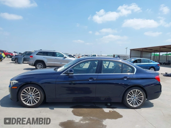 2013 BMW 3 Series 328i with VIN WBA3C1G51DNR49252, listed as a IAAI auction lot 42322739 with 119,421 mi miles and . Bid and sale history available at DreamBid. Image 14.