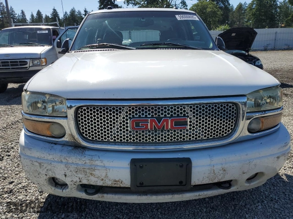 2005 GMC Yukon Denali z VIN 1GKEK63U55J143324, wystawiony jako Copart lot #59000695 z przebiegiem Nie podano mil oraz Szkoda całkowita • Salvage title. Historia ofert i sprzedaży dostępna na DreamBid. Obrazek 5.