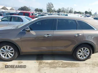 2019 Kia Sorento L with VIN 5XYPG4A35KG438309, listed as a IAAI auction lot 41539011 with 73,312 mi miles. Bid and sale history available at carsss.com. Image 14.