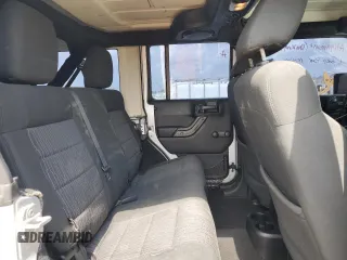 2012 Jeep Wrangler Unlimited Sport z VIN 1C4BJWDG8CL220960, wystawiony jako Copart lot #57823315 z przebiegiem 177 541 mil mil oraz Szkoda całkowita • Salvage title. Historia ofert i sprzedaży dostępna na DreamBid. Obrazek 11.