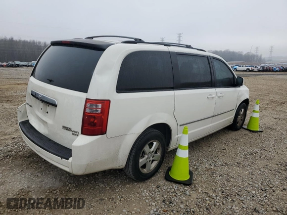 2010 Dodge Grand Caravan SXT with VIN 2D4RN5D12AR244722, listed as a Copart auction lot 43725005 with 210,546 mi miles and Clean Title. Bid and sale history available at DreamBid. Image 3.