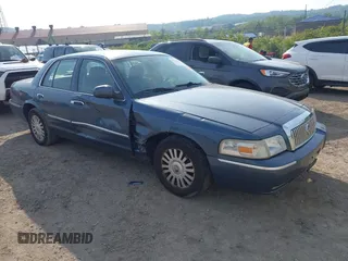 2007 Mercury Grand Marquis LS z VIN 2MEFM75V77X637537, wystawiony jako IAAI lot #42370419 z przebiegiem 59 173 mil mil oraz . Historia ofert i sprzedaży dostępna na DreamBid. Obrazek 1.