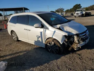 2016 Honda Odyssey Touring Elite with VIN 5FNRL5H93GB045542, listed as a Copart auction lot 46195125 with 157,897 mi miles and Salvage title. Bid and sale history available at DreamBid. Image 4.
