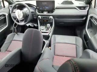 2024 Toyota RAV4 XSE with VIN JTMEB3FV2RD208004, listed as a Copart auction lot 61501635 with 8,392 mi miles and Salvage title. Bid and sale history available at DreamBid. Image 8.