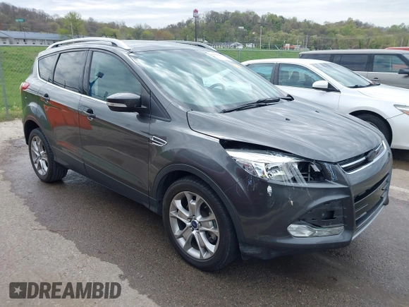 2015 Ford Escape Titanium with VIN 1FMCU0J90FUA25086, listed as a IAAI auction lot 41993681 with 126,170 mi miles. Bid and sale history available at carsss.com. Image 1.