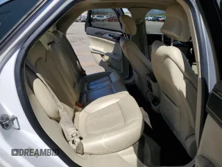 2013 Lincoln MKZ z VIN 3LN6L2GKXDR814615, wystawiony jako Copart lot #65654335 z przebiegiem 100 510 mil mil oraz Szkoda całkowita • Salvage title. Historia ofert i sprzedaży dostępna na DreamBid. Obrazek 10.
