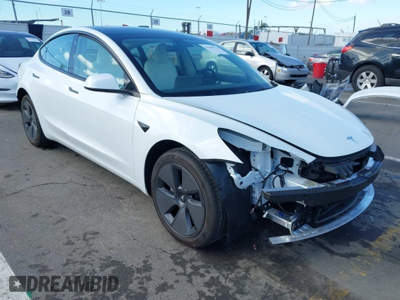 2023 Tesla Model 3 with VIN 5YJ3E1EA6PF495631, listed as a IAAI auction lot 41568118 with 10,073 mi miles and . Bid and sale history available at DreamBid. Image 1.