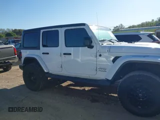 2019 Jeep Wrangler Unlimited Sahara with VIN 1C4HJXEN2KW591557, listed as a IAAI auction lot 41962034 with 88,691 mi miles and . Bid and sale history available at DreamBid. Image 13.