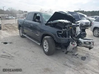 2021 Ram 1500 Laramie with VIN 1C6SRFJT6MN666399, listed as a IAAI auction lot 41683840 with 29,111 mi miles. Bid and sale history available at carsss.com. Image 1.