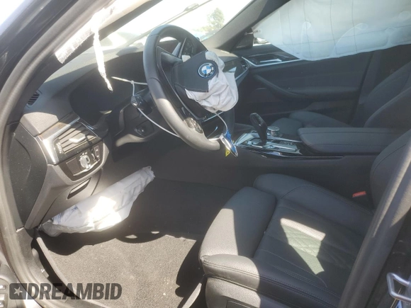 2023 BMW 5 Series 530e with VIN WBA13AG00PCL24045, listed as a Copart auction lot 84961634 with Not provided miles and Salvage title. Bid and sale history available at DreamBid. Image 7.