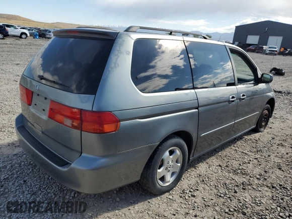 2001 Honda Odyssey EX z VIN 2HKRL18691H571178, wystawiony jako Copart lot #57343205 z przebiegiem 198 506 mil mil oraz Czysty tytuł • Clean title. Historia ofert i sprzedaży dostępna na DreamBid. Obrazek 3.