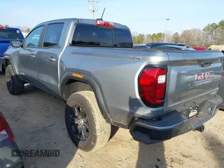 2024 GMC Canyon 4WD Elevation with VIN 1GTP6BEK9R1205603, listed as a IAAI auction lot 41485820 with 8,408 mi miles. Bid and sale history available at carsss.com. Image 3.