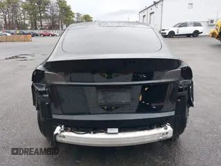 2022 Tesla Model Y Performance with VIN 7SAYGDEF7NF403701, listed as a IAAI auction lot 41961532 with 83,728 mi miles and . Bid and sale history available at DreamBid. Image 17.