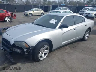 2014 Dodge Charger Police with VIN 2C3CDXAG9EH282796, listed as a IAAI auction lot 41596410 with 202,752 mi miles. Bid and sale history available at carsss.com. Image 2.