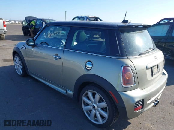 2007 MINI Hardtop S with VIN WMWMF73567TL91385, listed as a IAAI auction lot 41866865 with 114,778 mi miles and . Bid and sale history available at DreamBid. Image 3.