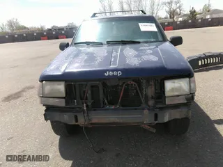 1994 Jeep Grand Cherokee Laredo with VIN 1J4GZ58Y3RC202638, listed as a IAAI auction lot 41885484 with 164,481 mi miles. Bid and sale history available at carsss.com. Image 6.