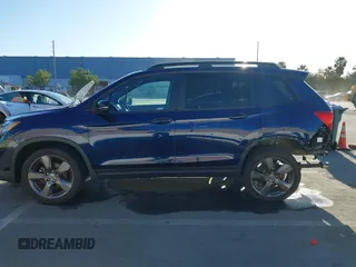 2020 Honda Passport Touring with VIN 5FNYF7H90LB004665, listed as a IAAI auction lot 41669821 with 59,768 mi miles and . Bid and sale history available at DreamBid. Image 15.