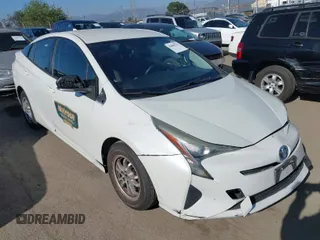 2016 Toyota Prius Two with VIN JTDKBRFUXG3001716, listed as a IAAI auction lot 42009763 with 177,132 mi miles and . Bid and sale history available at carsss.com. Image 1.