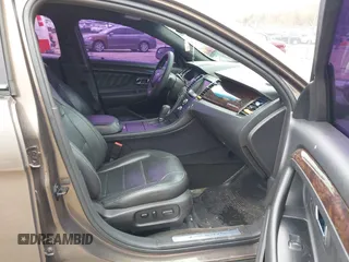 2015 Ford Taurus Limited with VIN 1FAHP2J84FG110702, listed as a IAAI auction lot 42060437 with 208,012 mi miles. Bid and sale history available at carsss.com. Image 5.