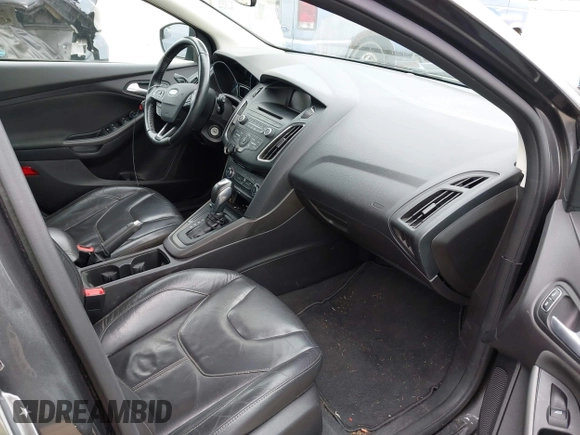 2015 Ford Focus SE with VIN 1FADP3K26FL269811, listed as a IAAI auction lot 42148333 with 157,192 mi miles. Bid and sale history available at carsss.com. Image 5.