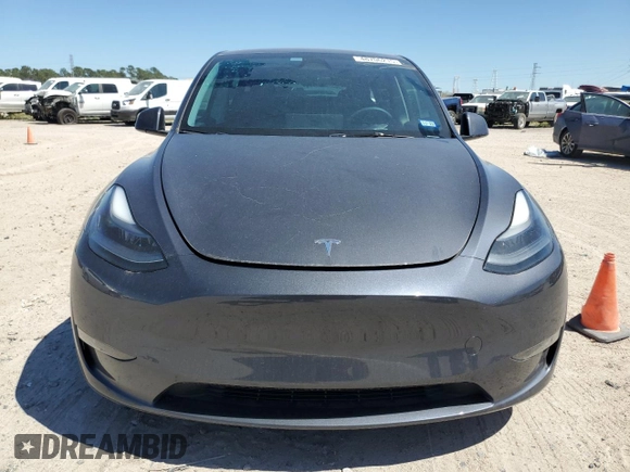 2023 Tesla Model Y Long Range z VIN 7SAYGDEE8PA185193, wystawiony jako Copart lot #48706215 z przebiegiem 10 451 mil mil oraz Szkoda całkowita • Salvage title. Historia ofert i sprzedaży dostępna na DreamBid. Obrazek 5.