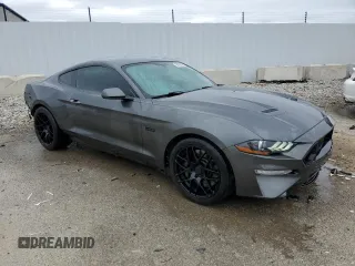 2018 Ford Mustang GT z VIN 1FA6P8CFXJ5113050, wystawiony jako Copart lot #50922565 z przebiegiem 75 609 mil mil oraz Szkody całkowita. Historia ofert i sprzedaży dostępna na DreamBid. Obrazek 4.