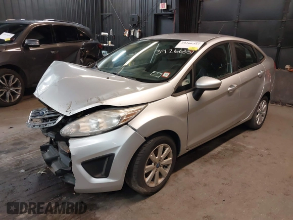 2012 Ford Fiesta SE with VIN 3FADP4BJ1CM110315, listed as a IAAI auction lot 39266357 with 144,749 mi miles. Bid and sale history available at carsss.com. Image 18.