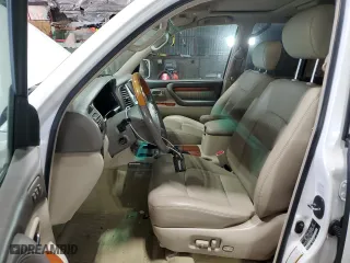 2006 Lexus LX 470 with VIN JTJHT00W464015842, listed as a Copart auction lot 66004384 with 104,402 mi miles and Salvage Title. Bid and sale history available at carsss.com. Image 7.