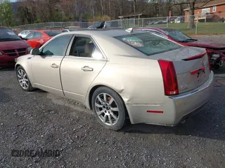 2009 Cadillac CTS AWD w/1SB with VIN 1G6DT57V090154165, listed as a IAAI auction lot 41907798 with 167,874 mi miles. Bid and sale history available at carsss.com. Image 3.