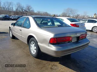 1995 Ford Thunderbird LX with VIN 1FALP62W9SH206490, listed as a IAAI auction lot 41744430 with 111,365 mi miles. Bid and sale history available at carsss.com. Image 3.