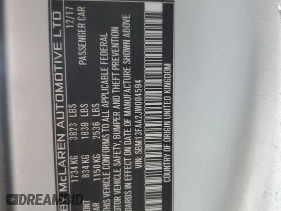 2018 McLaren 570S z VIN SBM13FAA2JW004594, wystawiony jako Copart lot #49730155 z przebiegiem Nie podano mil oraz Szkody całkowita. Historia ofert i sprzedaży dostępna na DreamBid. Obrazek 13.